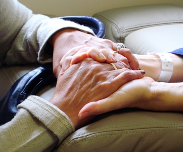 This photo of a "caring moment" is what every one hopes for ... for themselves or their loved ones ... when nursing home residency or assisted living becomes a personal reality.   Photo by Brazilian photographer Andy Reis.